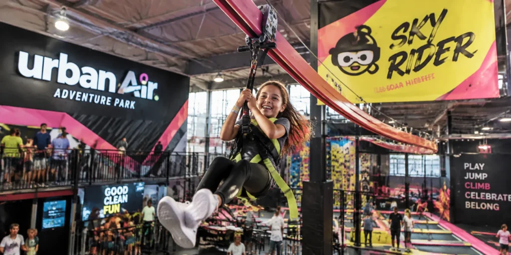 Kids on Sky Rider zipline at Urban Air Apple Valley