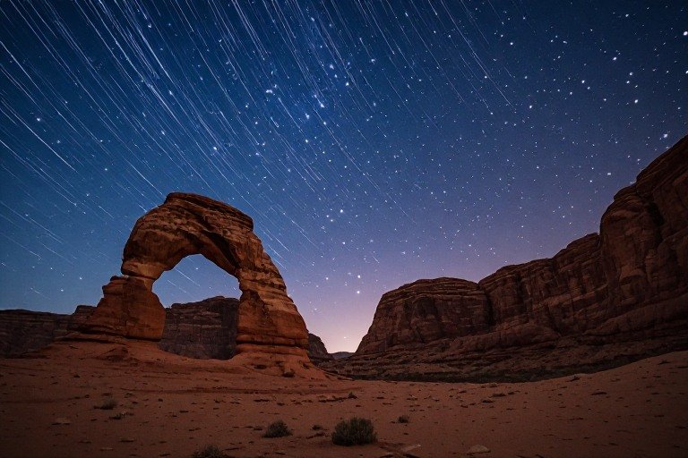 Utah Travel Guide 2026: Everything You Need Before Visiting Utah’s Mighty 5 5 Milky Way visible over a red rock desert landscape in Utah at night